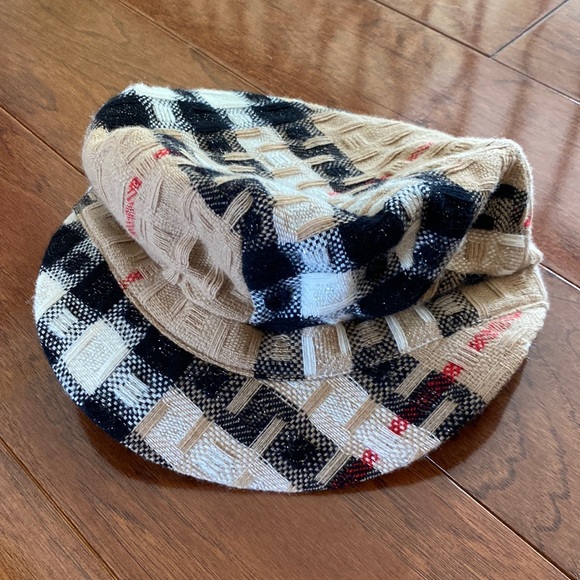 Burberry messenger cap in tan metallic. - Picture 1 of 9